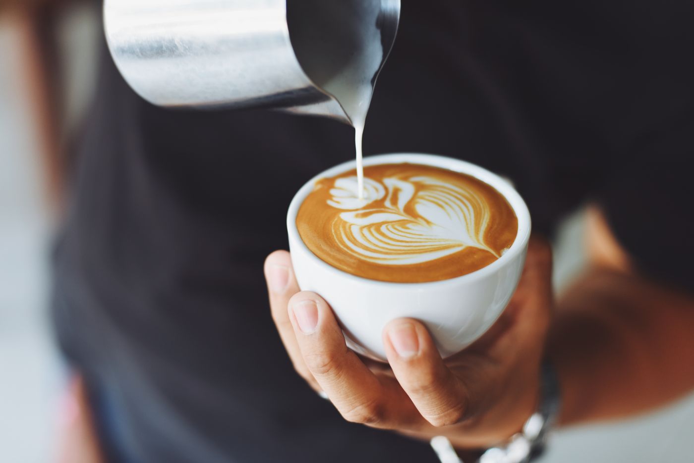 A latte on a wooden table. Second Pour.