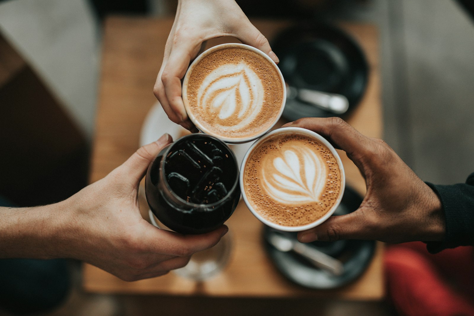 Coffee cups on a cafe counter. Second Pour.