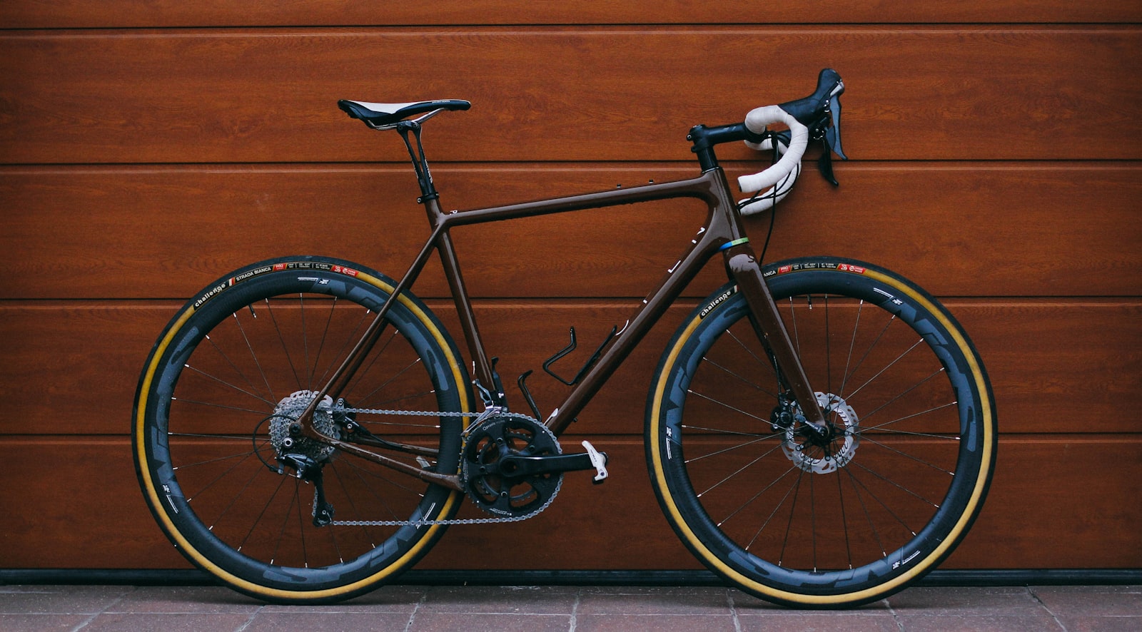 A bicycle on an empty road. Spoke Count.