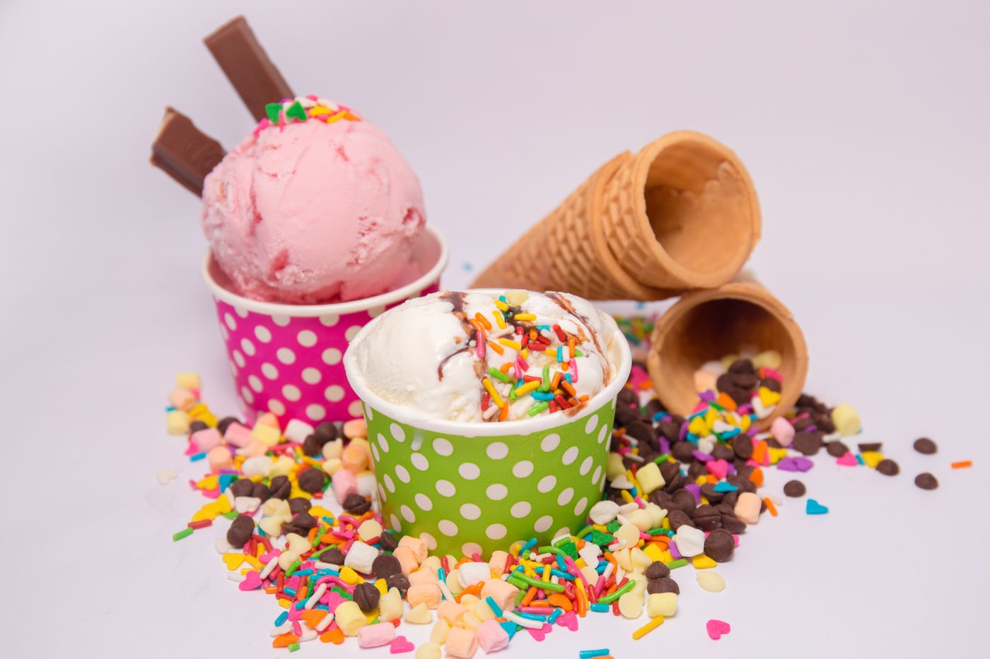 Scoops in a metal tin. Tin Spoon.