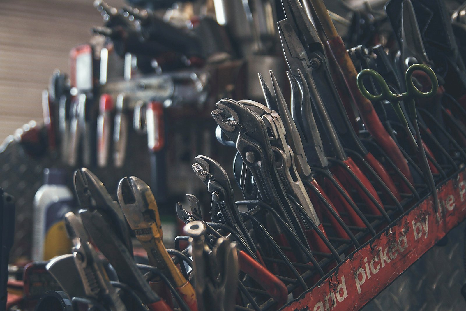 Hand tools packed in a red rack in the tune bay.